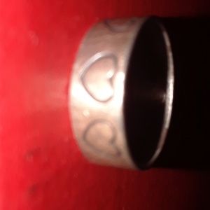 Sterling silver ring engraved with hearts all the